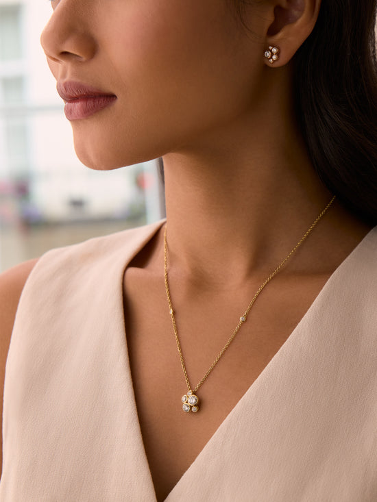 Raindance Yellow Gold Cluster Pendant and Earrings Set | Boodles