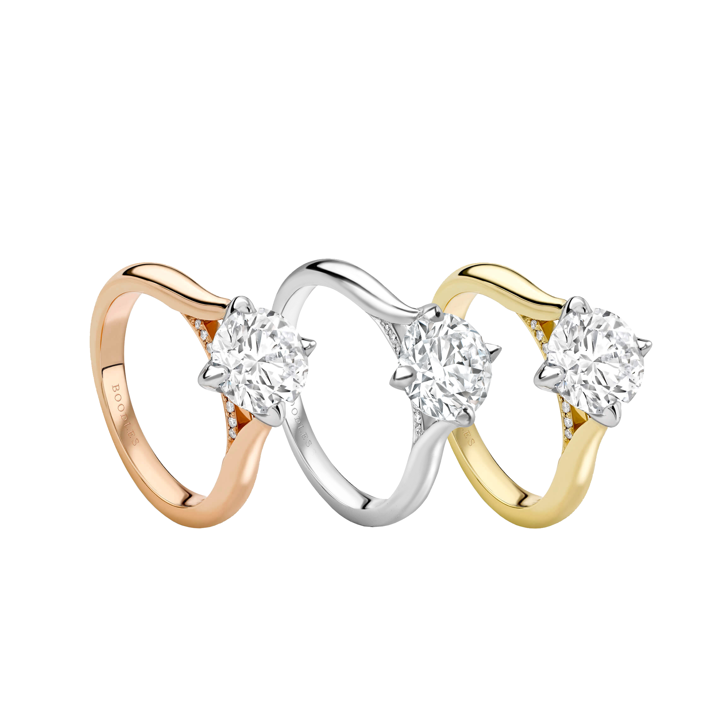 Boodles brilliant cut diamond engagement rings, rose gold, yellow gold, platinum.